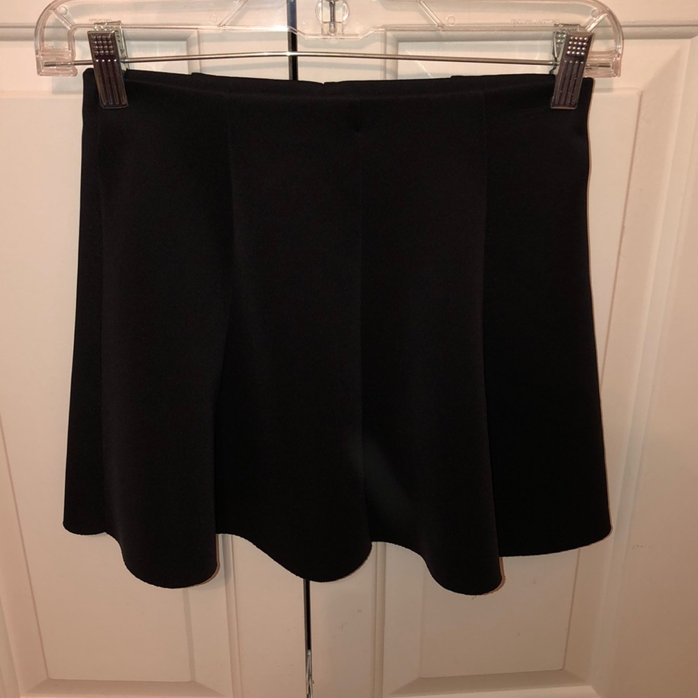 Black pleaded skirt